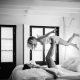 engagement session porto portugal destination couple wake up together pillow fight lello bookshop